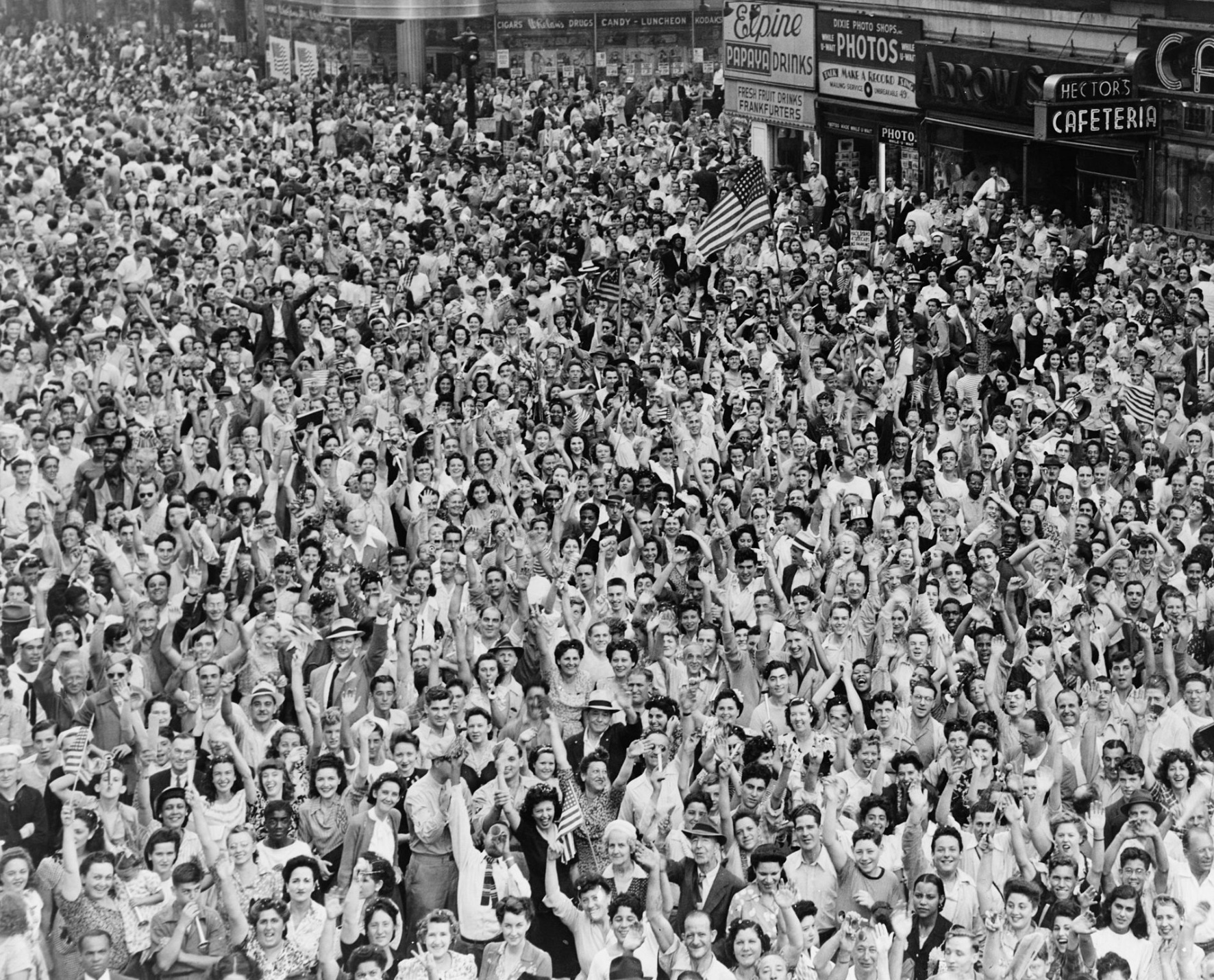 Crowds celebrating V-J Day in Times Square.